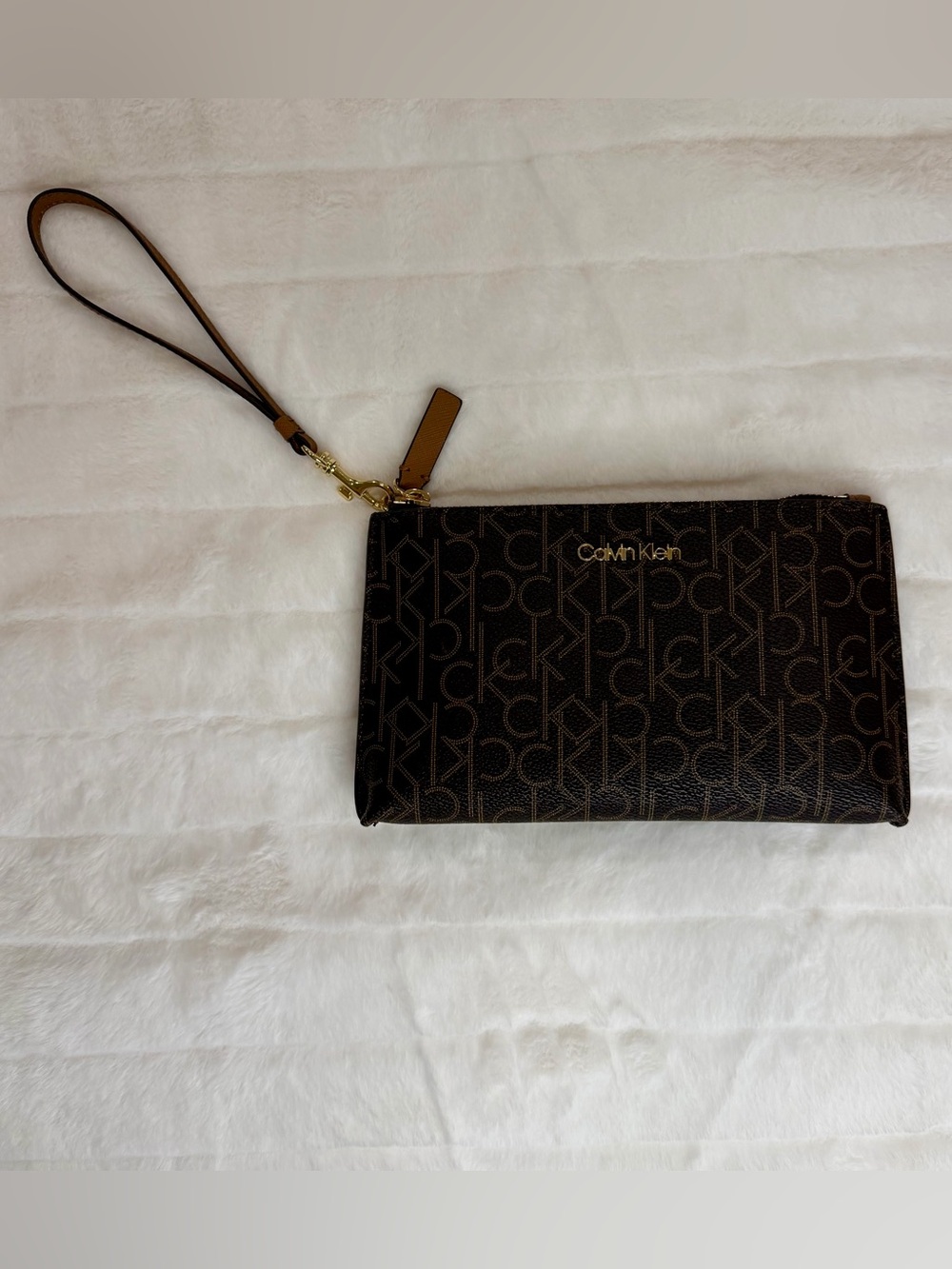 Calvin Klein Dark Brown Monogram Wristlet with Gold Hardware
